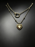 Fashionable necklace featuring a concentric circle design—a versatile, go-with-anything style.